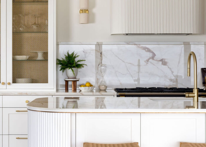 Custom made to measure modern classic kitchen with large island, quartz worktop, s-box power point, luxurious details and pendant lights