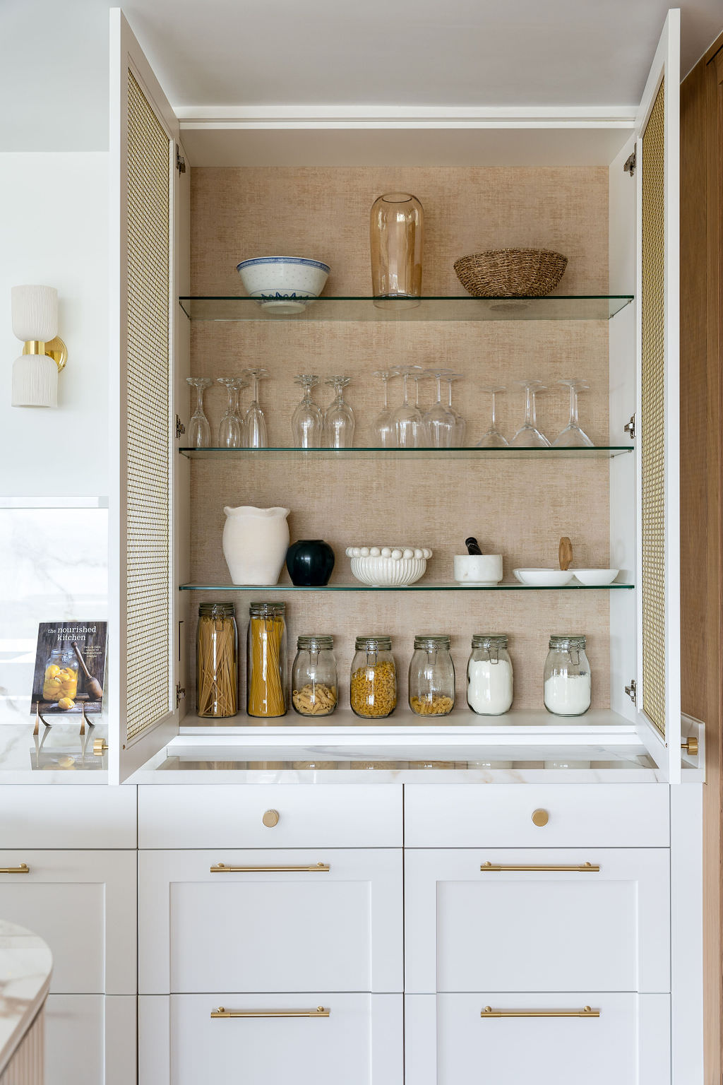 Custom made to measure modern classic kitchen with large island, quartz worktop, s-box power point, luxurious details and pendant lights